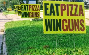 Eat Pizza Win Guns